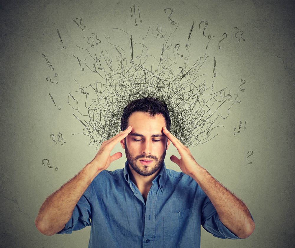 sad young man with worried stressed face expression and brain melting into lines