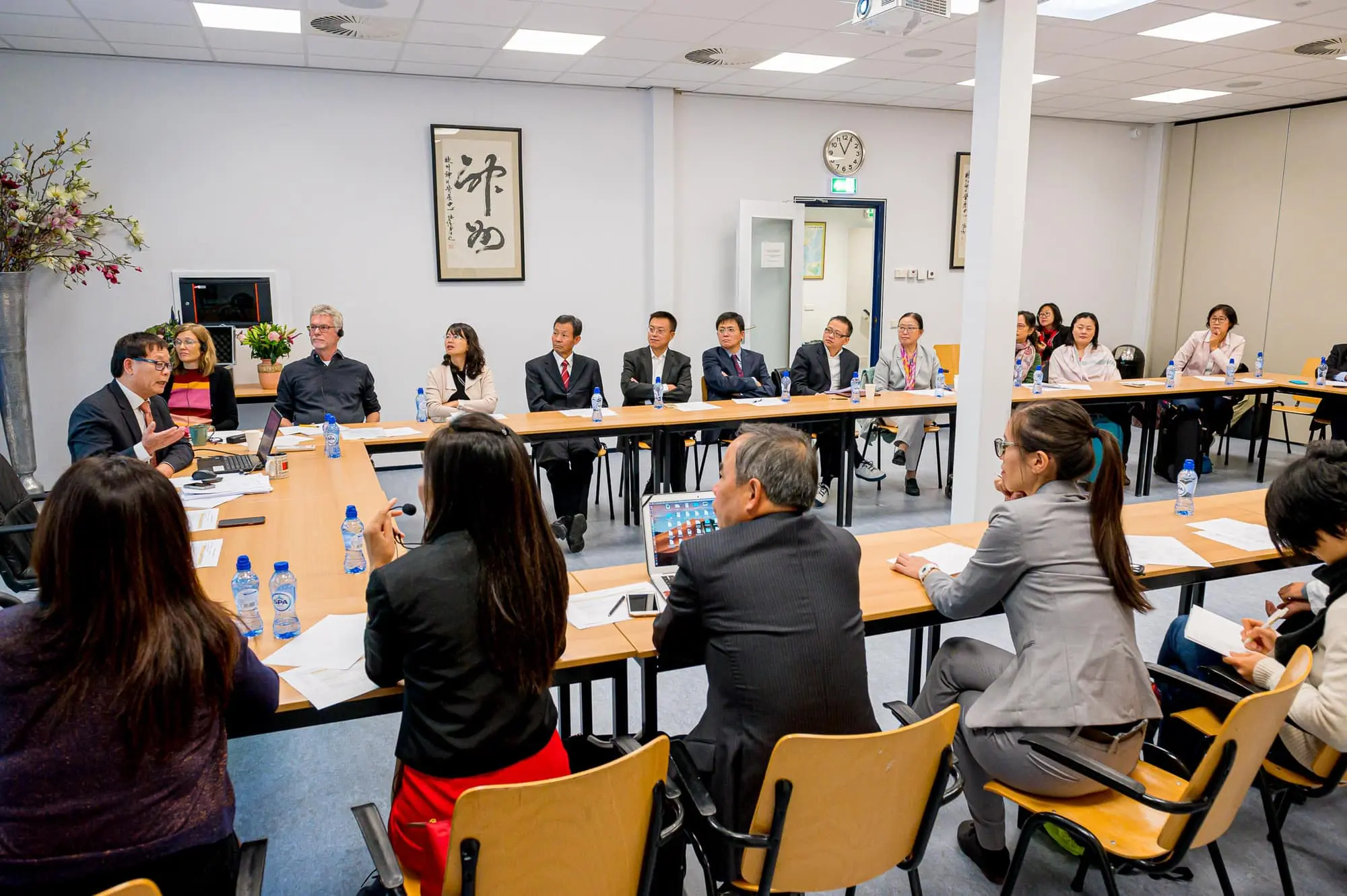Zhilin Dong, SOU president, presiding over the annual teachers’ meeting