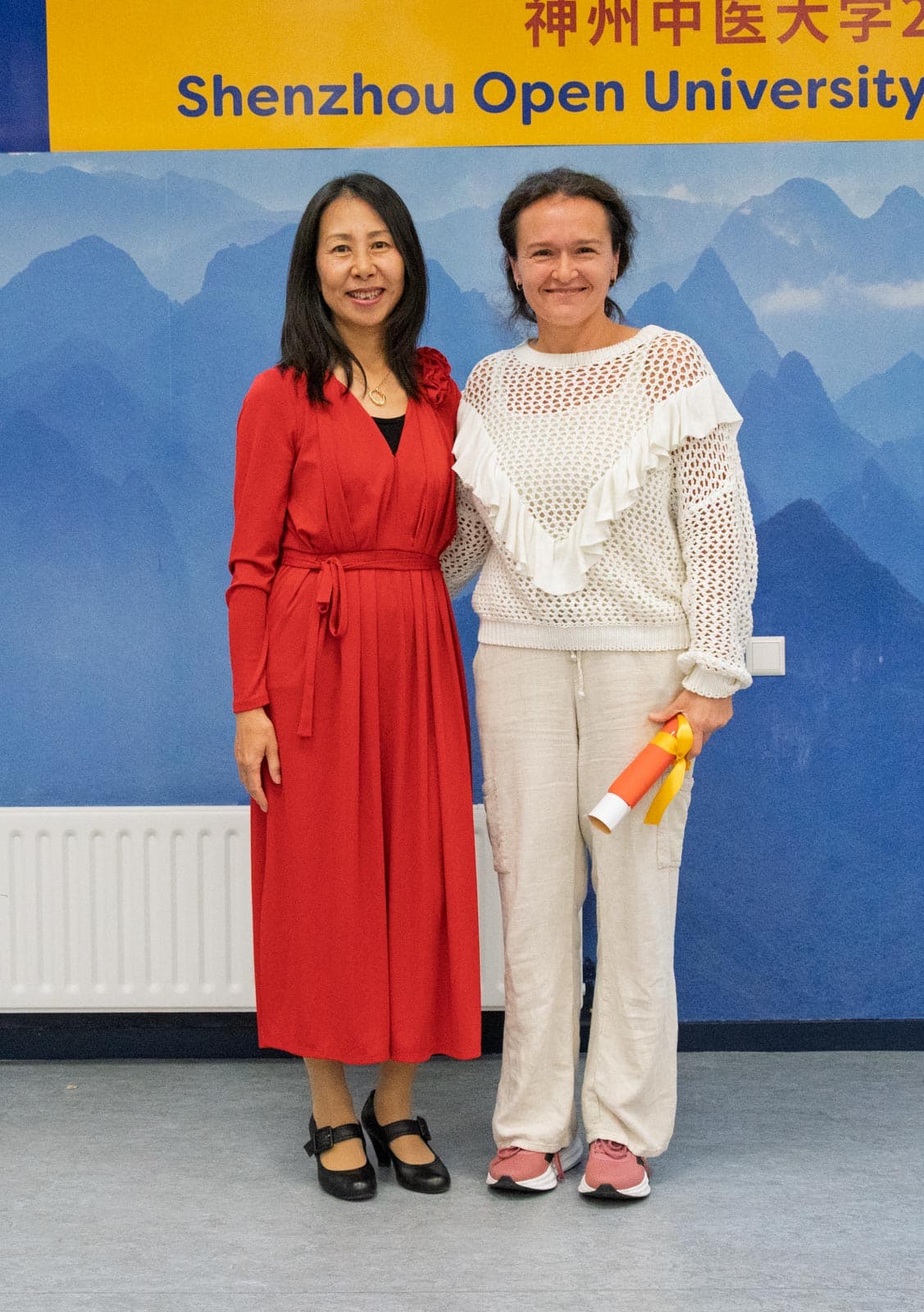 Dan Tan with one of the students